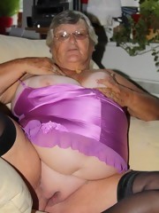 Granny Big Boobs whore woman shows pink pussy