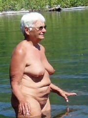 Granny big tits slut shows pink pussy