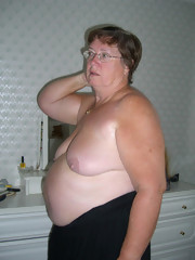 Granny Mommy big tits woman shows big boobs