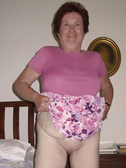 Granny Old Mature big tits slut shows pink pussy